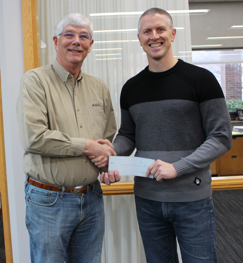 Group of People Holding Check