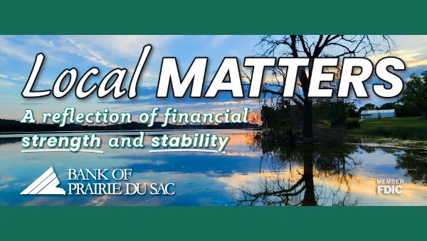 Sunset reflecting over Fish Lake. Text reads: Local Matters. A reflection of financial strength and stability. Bank of Prairie du Sac