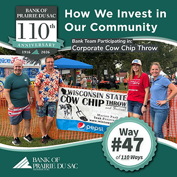 Way #47 - Bank staff participating as a team in Corporate Throw at annual State Cow Chip Festival.